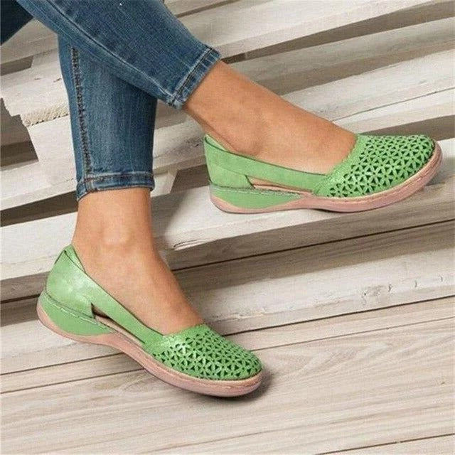 Women's perforated round toe wedge cutout sandals. Perfect casual summer footwear.