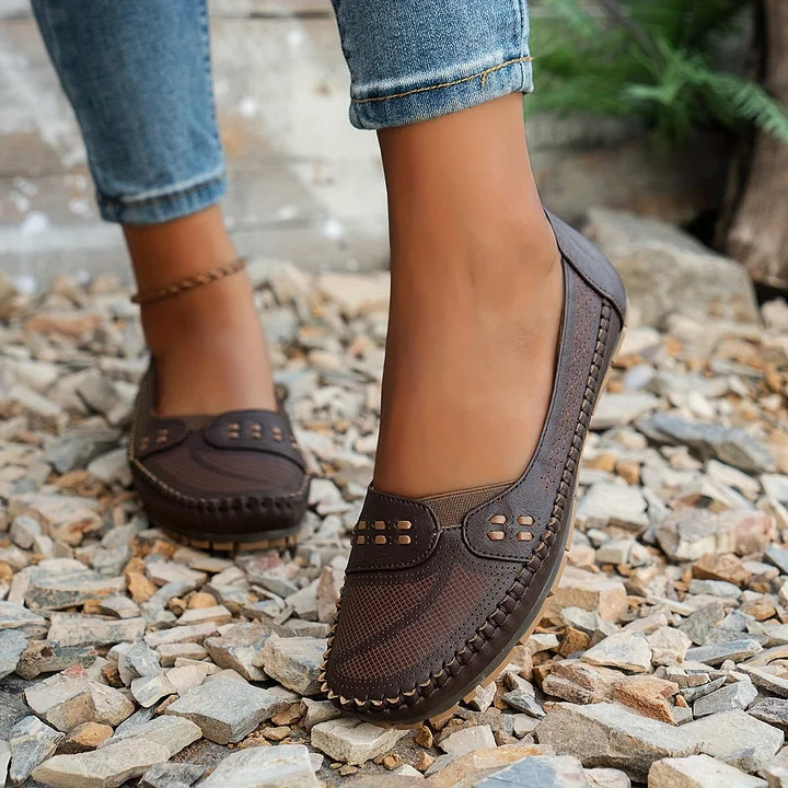 Women's perforated comfort slip-on loafers, ideal summer shoes for casual everyday fashion.