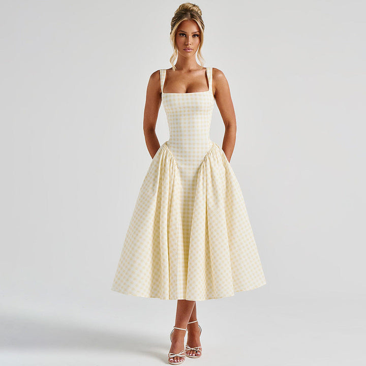 Women's pink checkered midi dress with square neck and princess silhouette, elegant summer style.