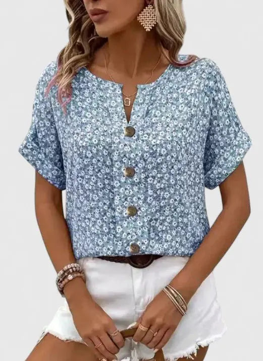 Blue floral print women's summer top, short sleeve, button-front design, ideal for vintage-inspired daily outfits.