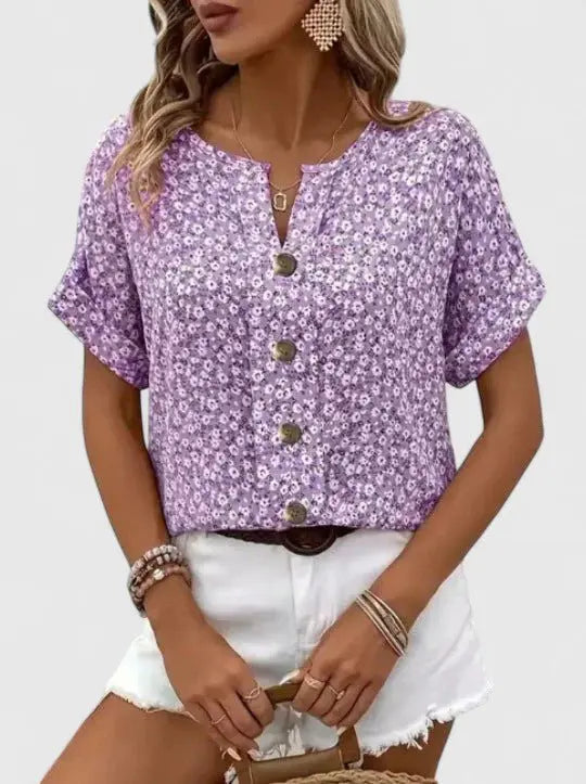 Purple floral print women's short sleeve blouse, button-front, stylish summer top for casual or daily wear.
