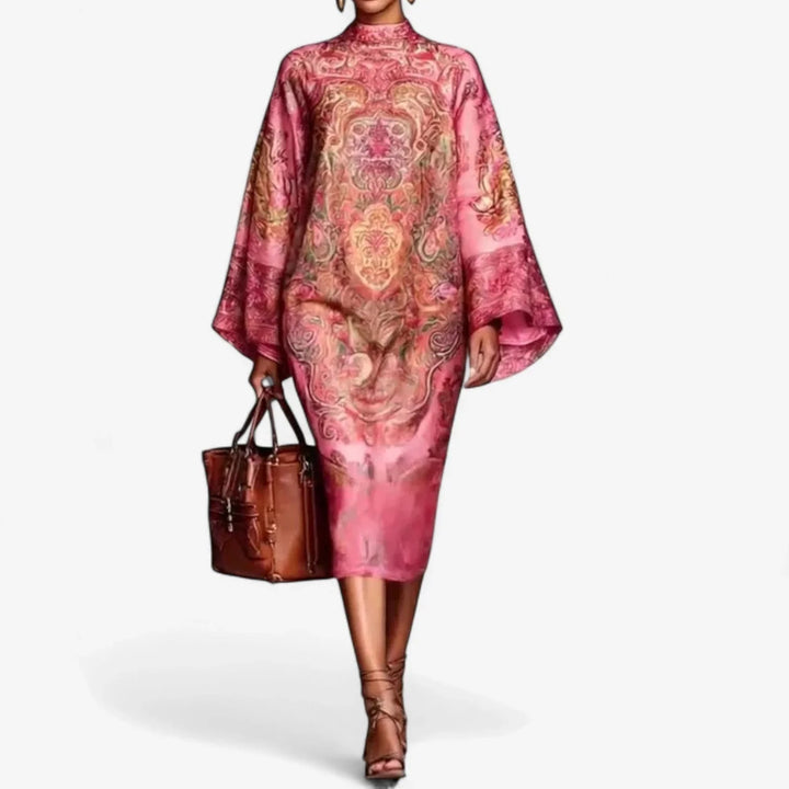 Women's pink printed caftan midi dress with batwing sleeves & mock neck, offering effortless summer style & comfort.