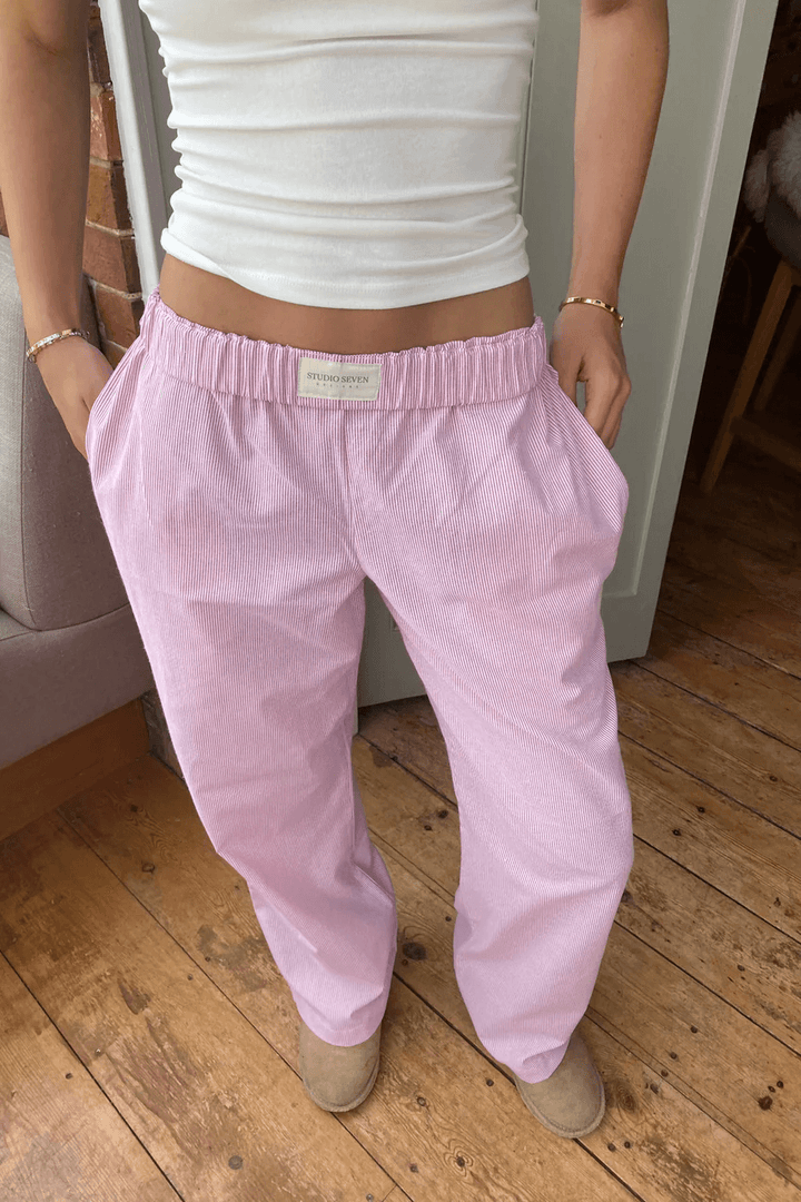Women's pink relaxed fit lounge trousers, lightweight & soft. Perfect for casual comfort and everyday style.