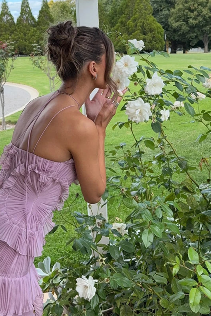 Lightweight women's ruffled halter maxi dress, perfect as a sleeveless and backless summer party or event dress.
