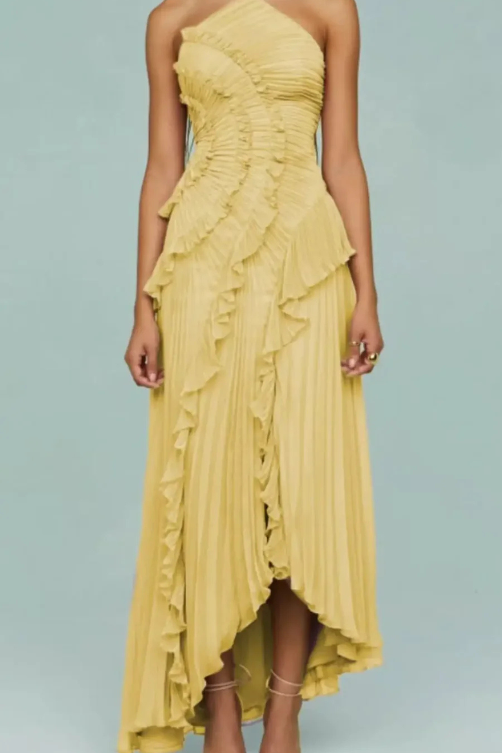 Versatile white ruffled sleeveless maxi dress, an elegant backless option for summer parties & special occasions.
