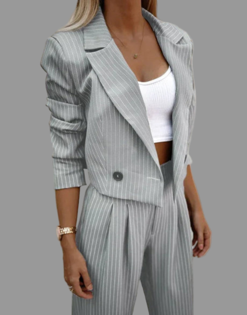 Professional women's pinstriped blazer with matching wide leg trousers. Versatile formal coordinated outfit.