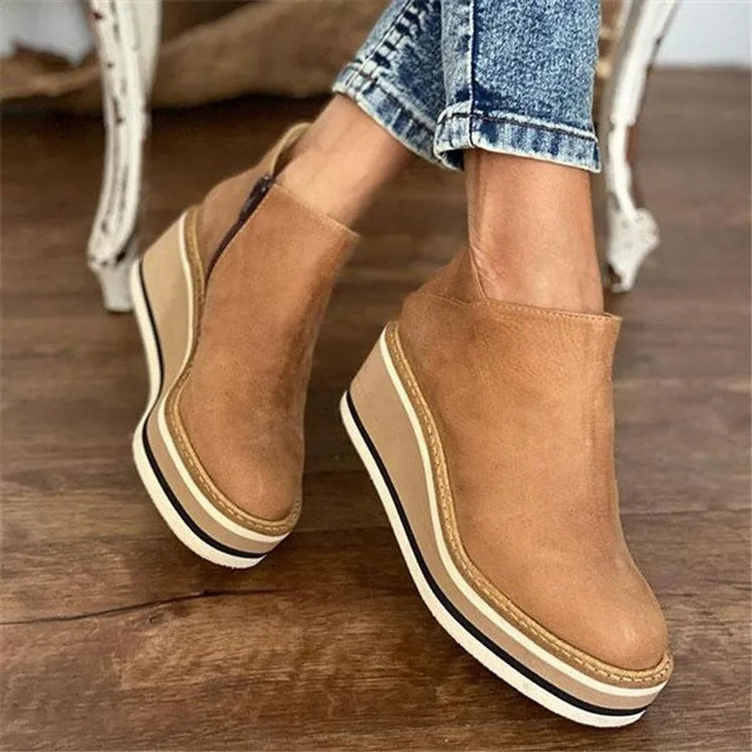 Women's platform wedge ankle boots with side zip, chunky sole for autumn/winter style.