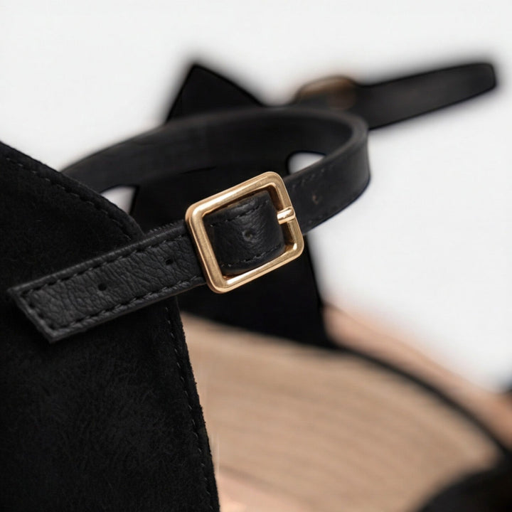 Comfortable women's espadrille wedge sandals featuring a secure ankle strap & closed toe for stylish summer wear.