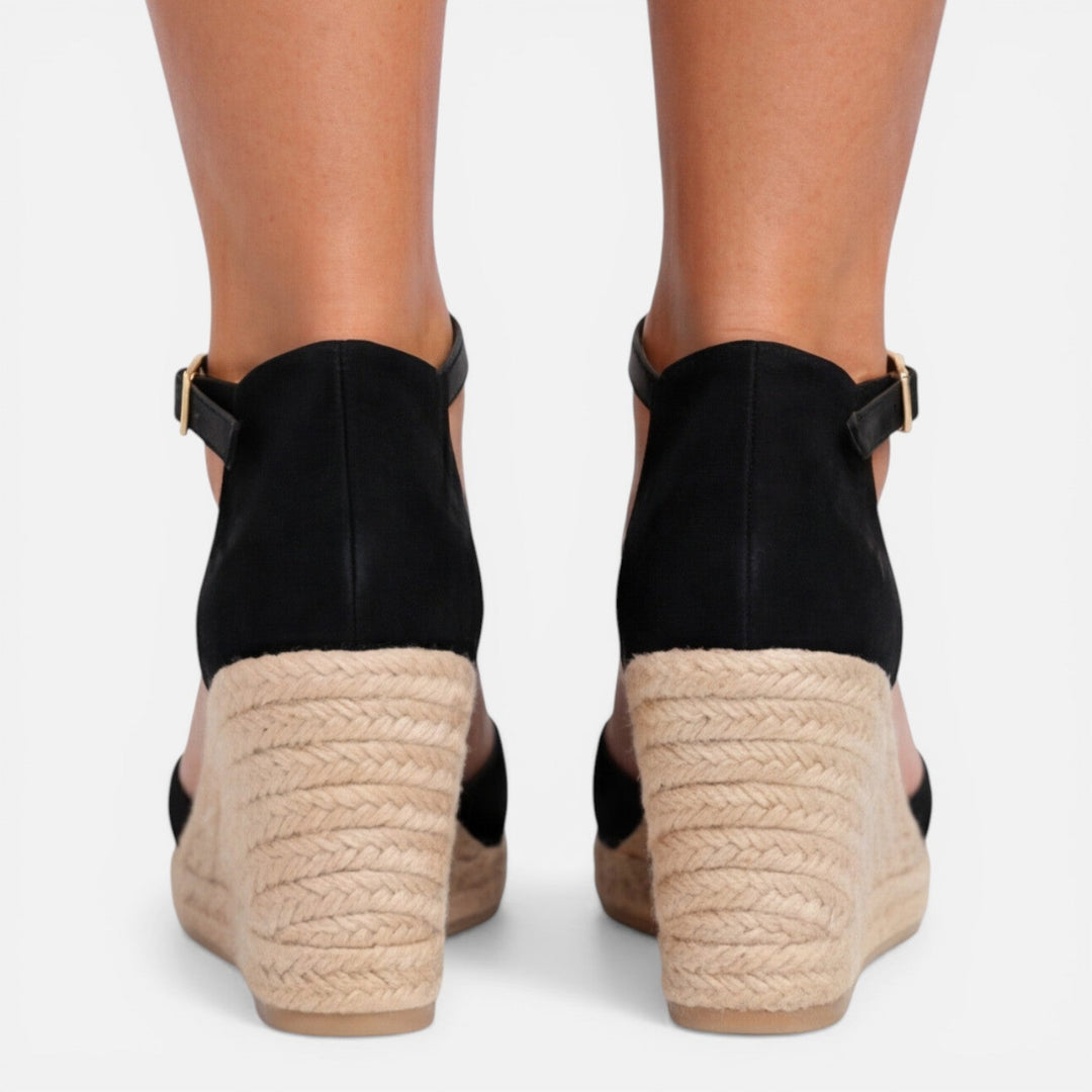 Women's closed-toe platform wedge espadrille sandals offering secure and comfortable footing for all-day wear.