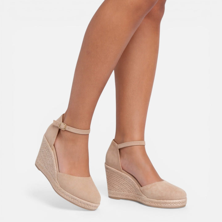 Fashionable women's platform espadrille sandals with a comfortable wedge heel & secure ankle strap, perfect for summer.
