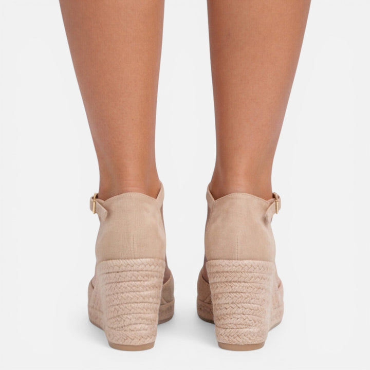 Secure women's espadrille platform sandals with a stylish wedge heel & comfortable ankle strap, great for vacation.