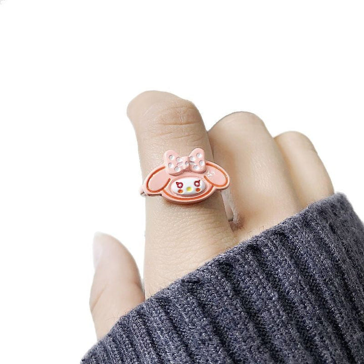 Cheerful motif cartoon ring for women. Playful statement jewelry, unique fashion accessory.