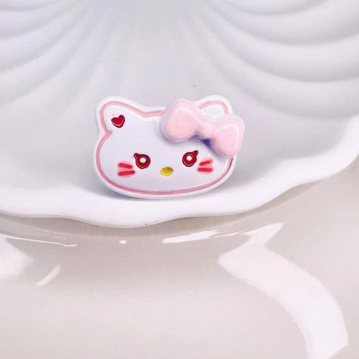 Women's playful cartoon motif ring. Unique fashion jewelry, a cheerful statement piece.