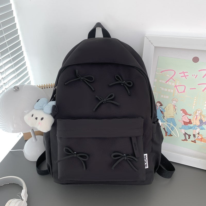 Fashionable women's backpack, combines playful style with functional design for everyday, school, & travel adventures.