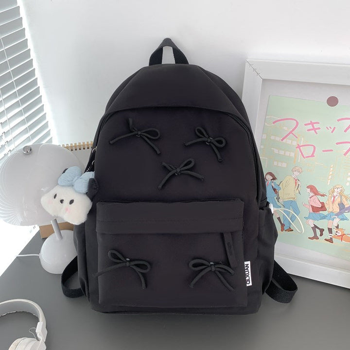 Fashionable women's backpack, combines playful style with functional design for everyday, school, & travel adventures.