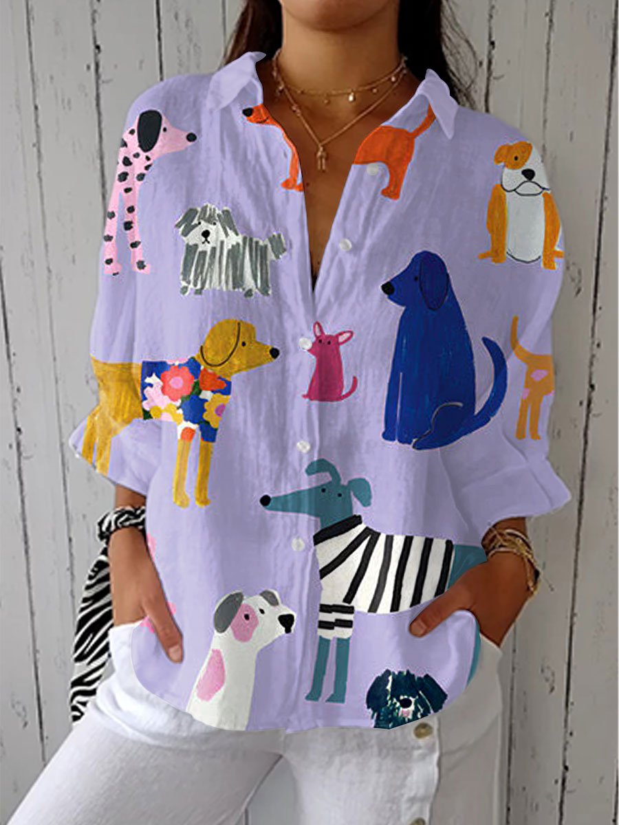 Women's playful dog print long sleeve blouse with a button-front, perfect for casual fashion and everyday wear.