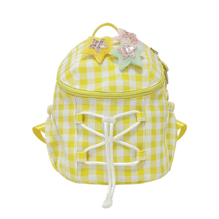Stylish women's mini backpack, black and white gingham with star graphic. Compact and playful for everyday carry.