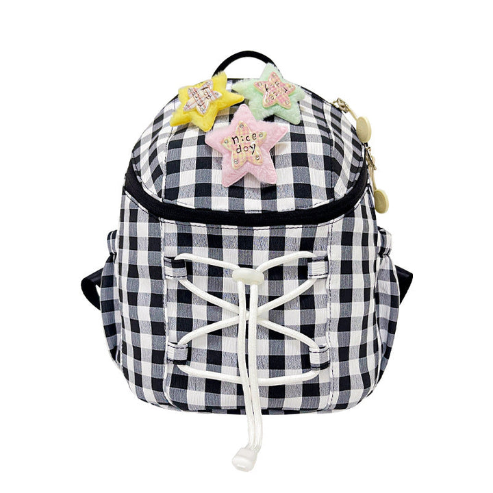 Playful mini backpack for women, black & white gingham with star graphic. Compact & stylish for everyday essentials.