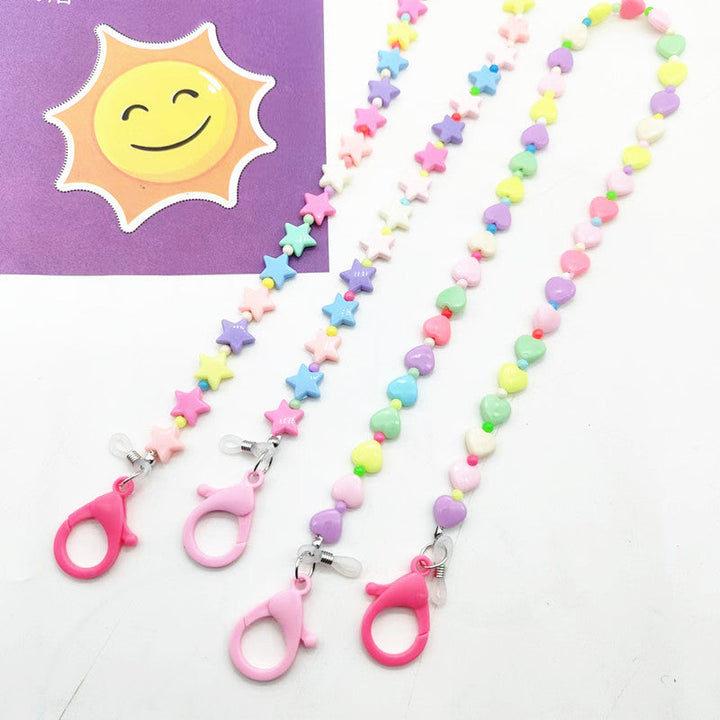 Women's playful necklace with colorful heart & star pendants, perfect accessory.