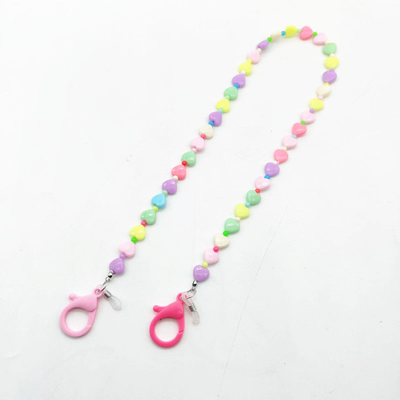 Elegant yet playful women's necklace with charming colorful heart & star pendants, a unique accessory.