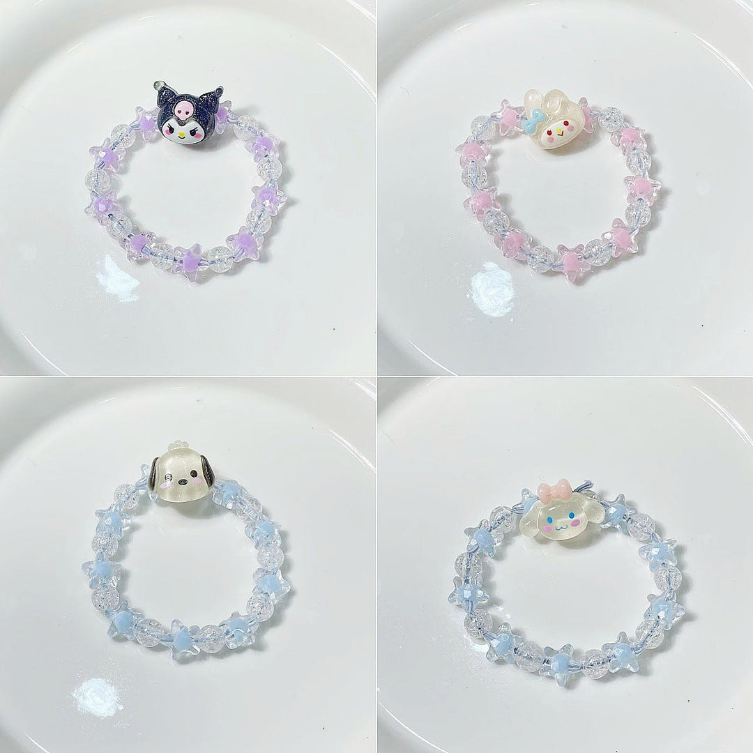 Colorful elastic bracelet for women featuring unique star and whimsical face charms, a trendy gift.