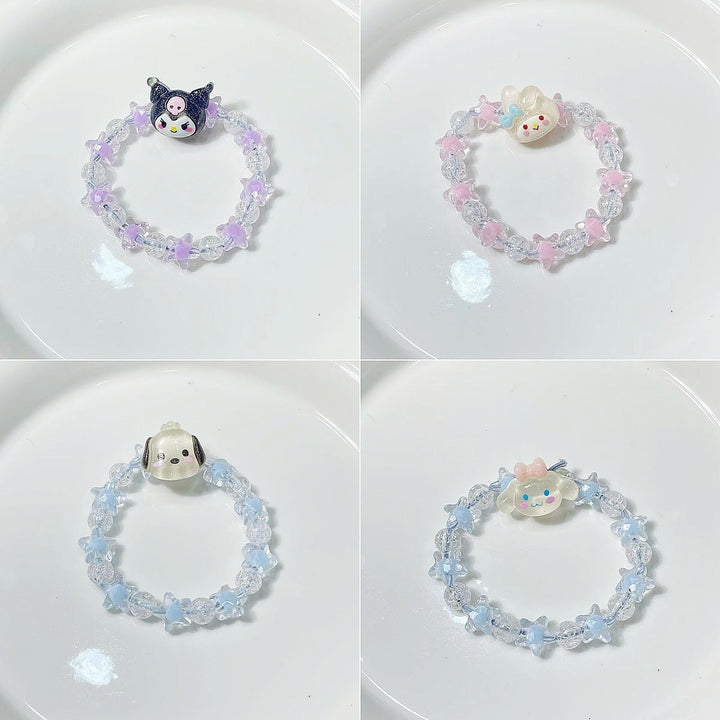Colorful elastic bracelet for women featuring unique star and whimsical face charms, a trendy gift.