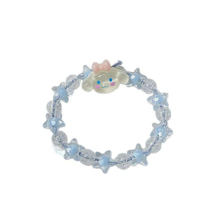 Playful women's jewelry: colorful beaded bracelet with star and quirky face pendant, perfect for gifting.