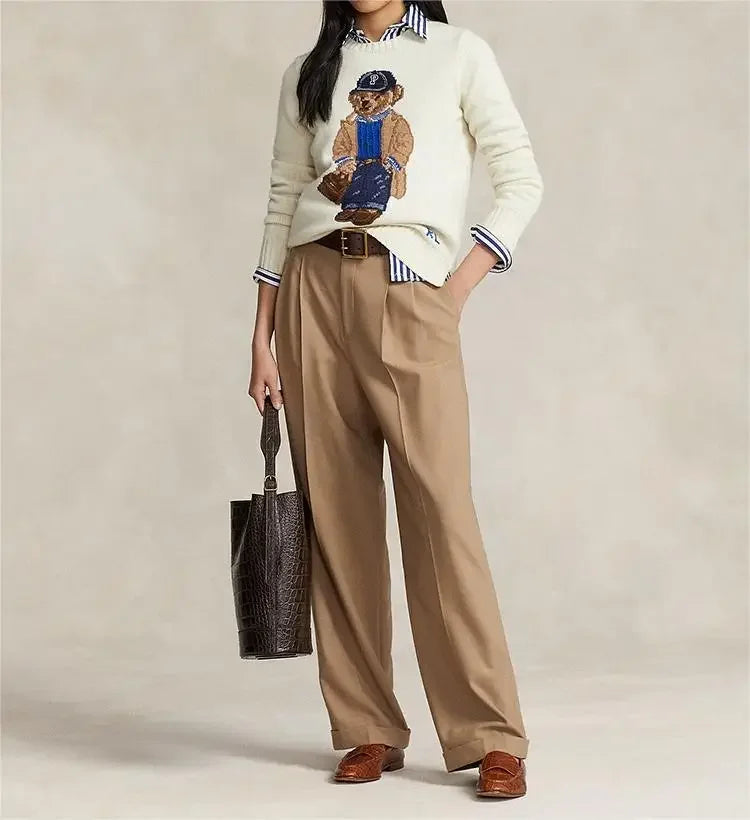 Women's playful white bear sweater. Cozy long sleeve top for cheerful casual winter fashion.