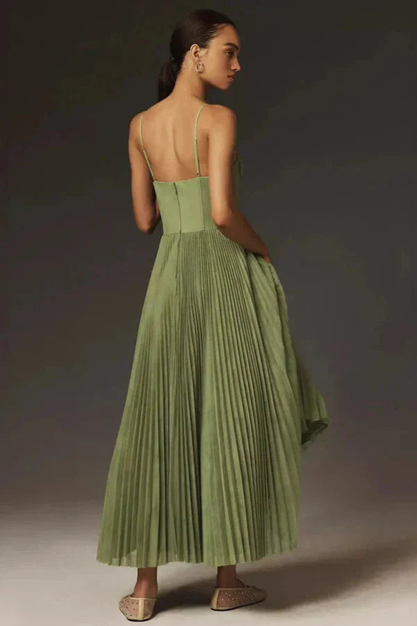 Stylish women's pleated midi dress featuring a flattering bustier top and A-line skirt. Great for occasions.