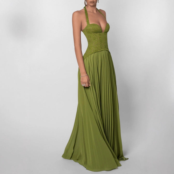 Elegant women's halterneck maxi dress with pleats, ideal for wedding guests & special occasion wear.