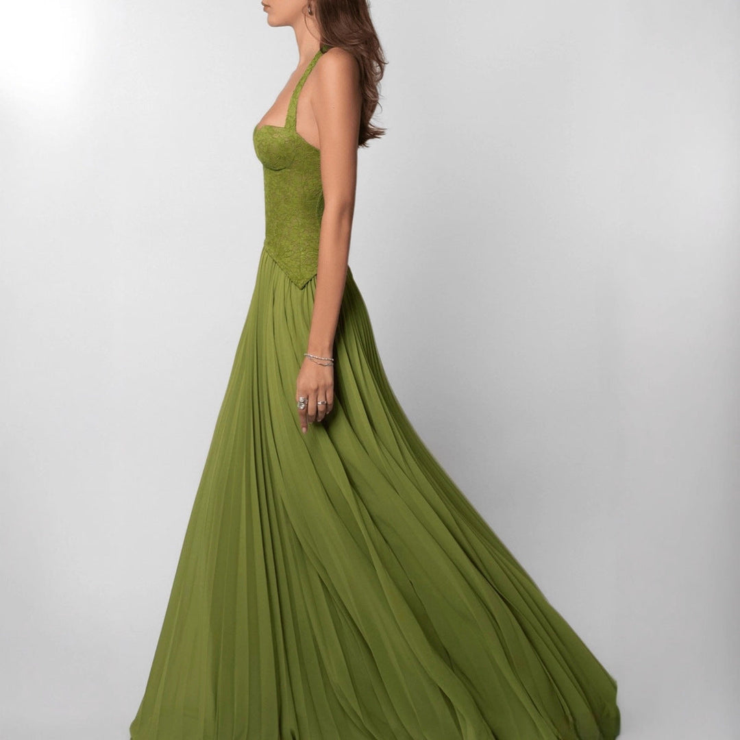 Flowing pleated halterneck maxi dress for women, a stylish & comfortable wedding guest outfit.