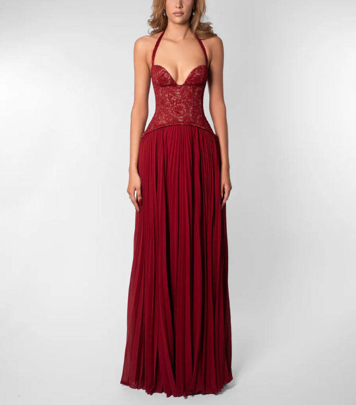 Stunning women's halterneck maxi dress with elegant pleats, a must-have for wedding guests.