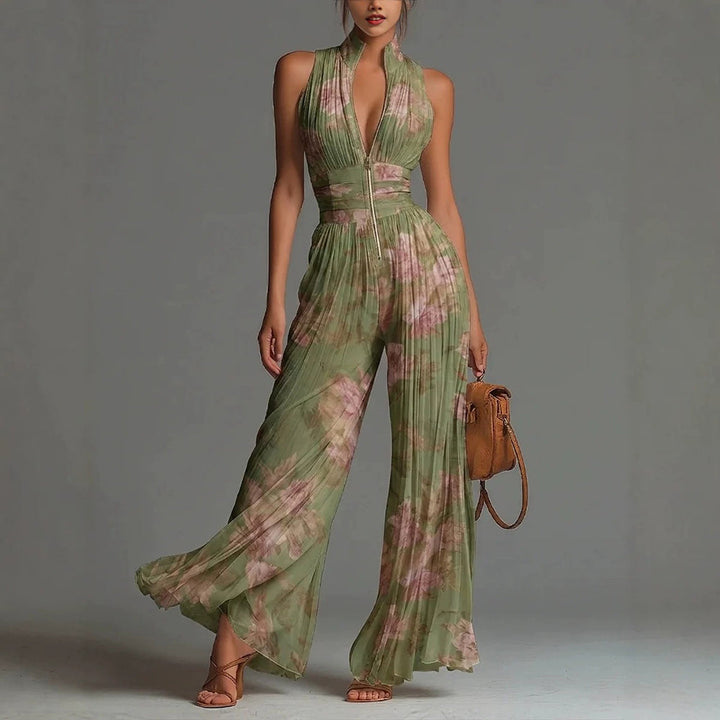 Women's pleated mock neck wide leg sleeveless jumpsuit. Elegant one-piece for casual or smart wear.