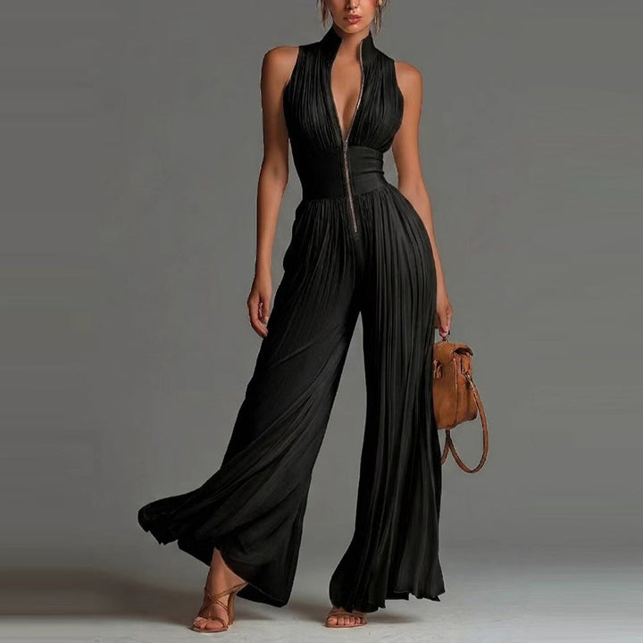 Women's versatile sleeveless wide leg jumpsuit with pleated detail & mock neck. Smart casual elegance.