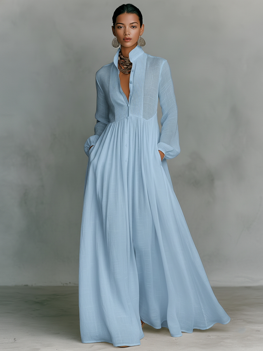 Relaxed fit women's pleated maxi dress with button front & pintuck details. Perfect casual elegance for all seasons.