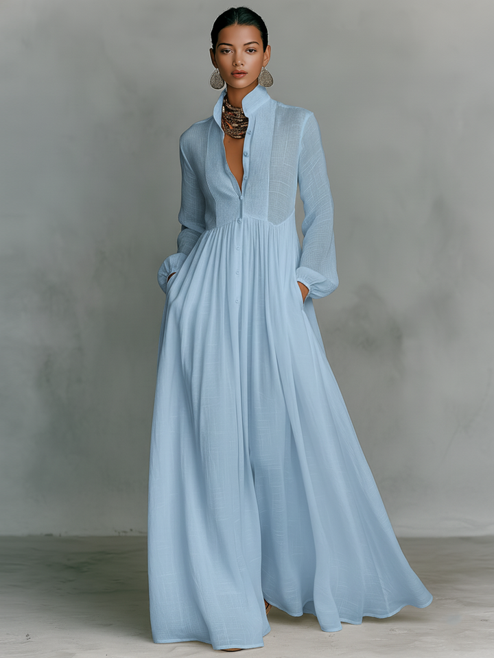 Relaxed fit women's pleated maxi dress with button front & pintuck details. Perfect casual elegance for all seasons.