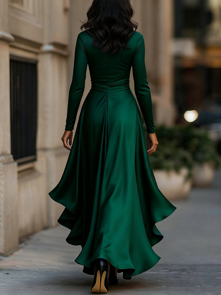 Full-length women's formal maxi dress with pleats, V-neck, long sleeves, and ruffle hem, for evening elegance.