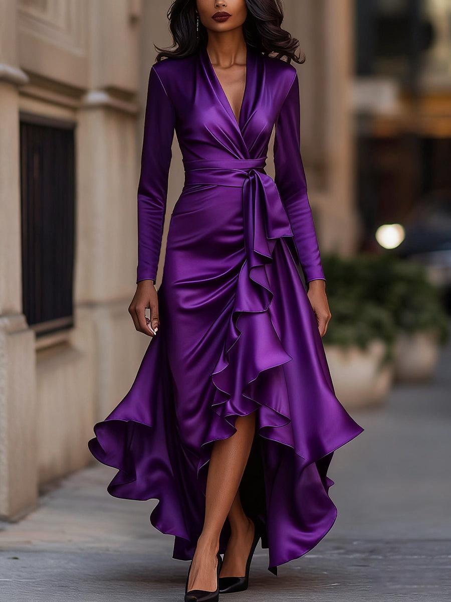 Detail of the flattering wrap style on a women's elegant pleated long sleeve maxi dress, perfect for evenings.