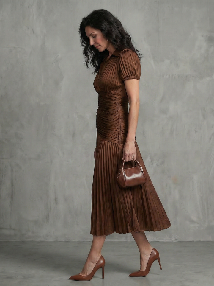 Fashionable women's pleated stripe midi dress, collared for a refined touch. Great for warm weather.
