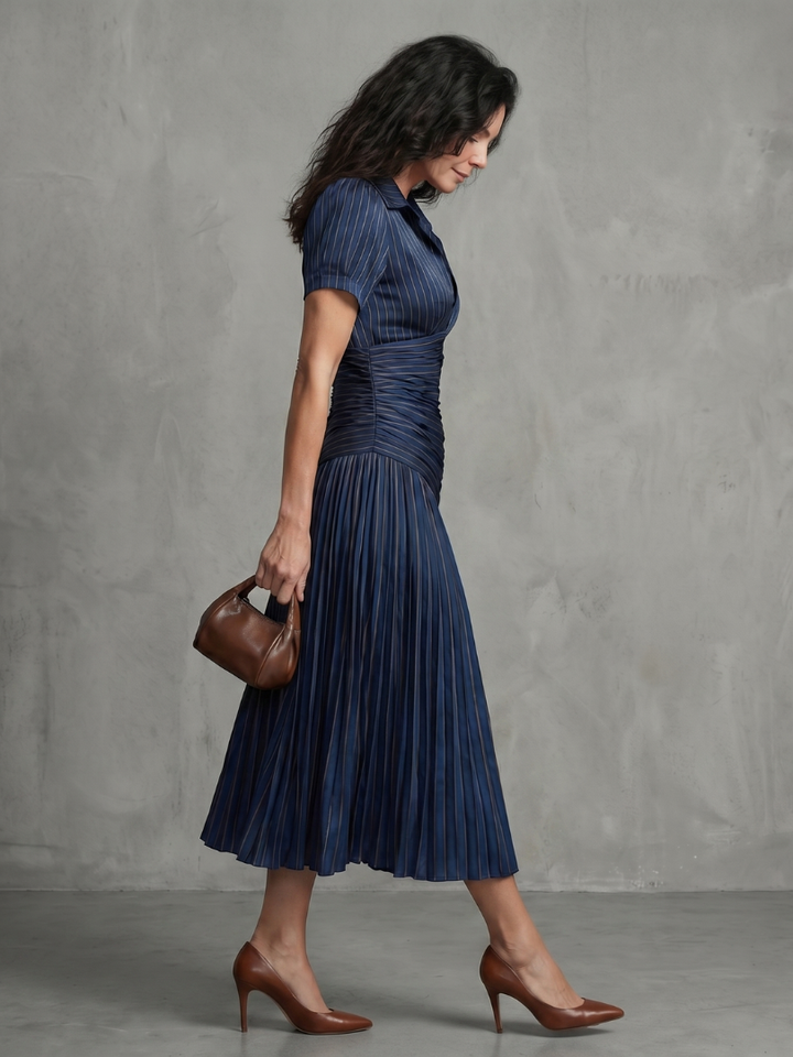 Casual short sleeve collared pleated stripe midi dress for women. A comfortable and stylish summer outfit.