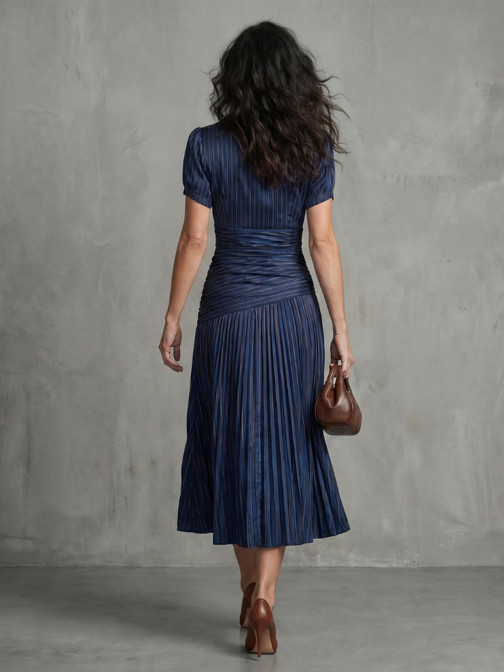 Workwear-ready women's collared stripe midi dress with elegant pleats & short sleeves. Professional look.