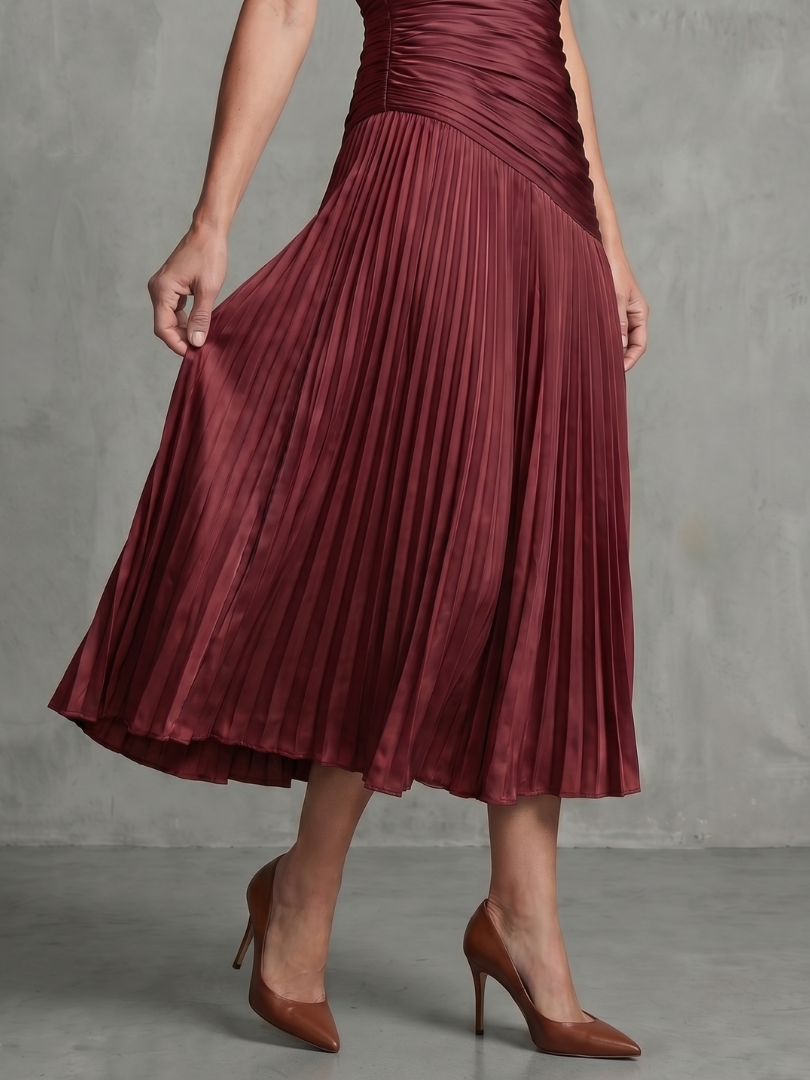Women's elegant collared midi dress with a fresh stripe pattern and graceful pleats. Short sleeves.