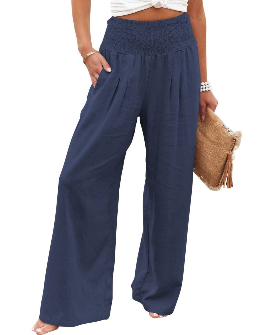 Elegant women's pleated wide leg trousers. Elastic waist offers a comfortable & stylish casual look.