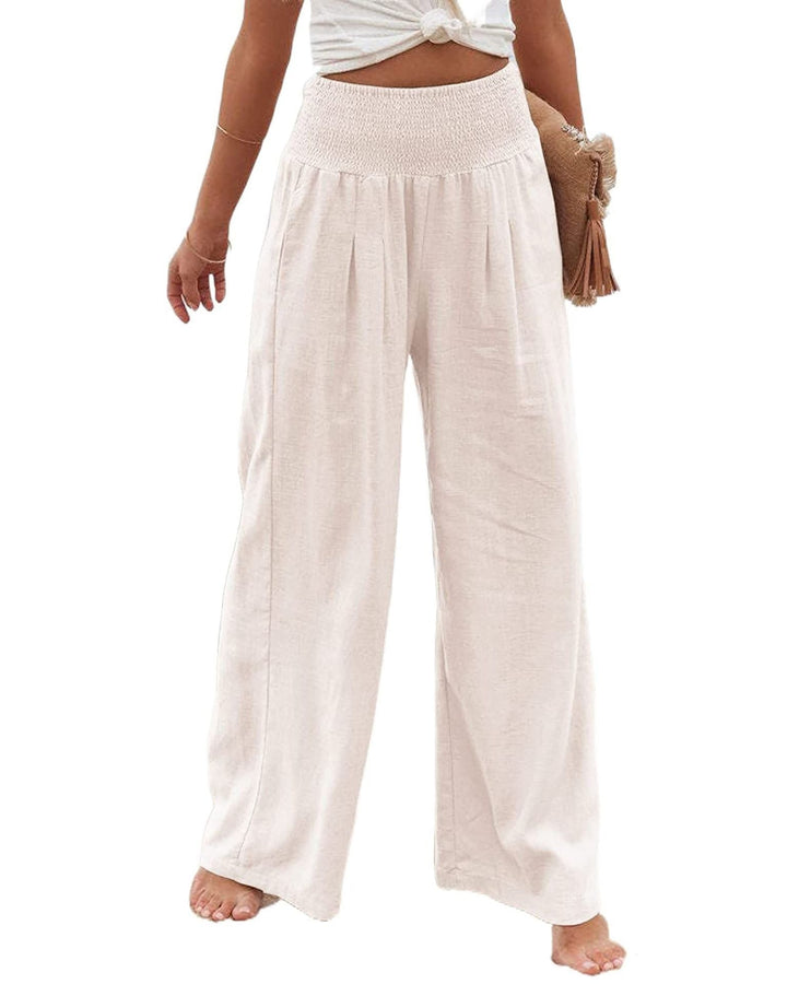 Comfortable women's wide leg linen blend pants with pleats & elastic waist for flowy movement.