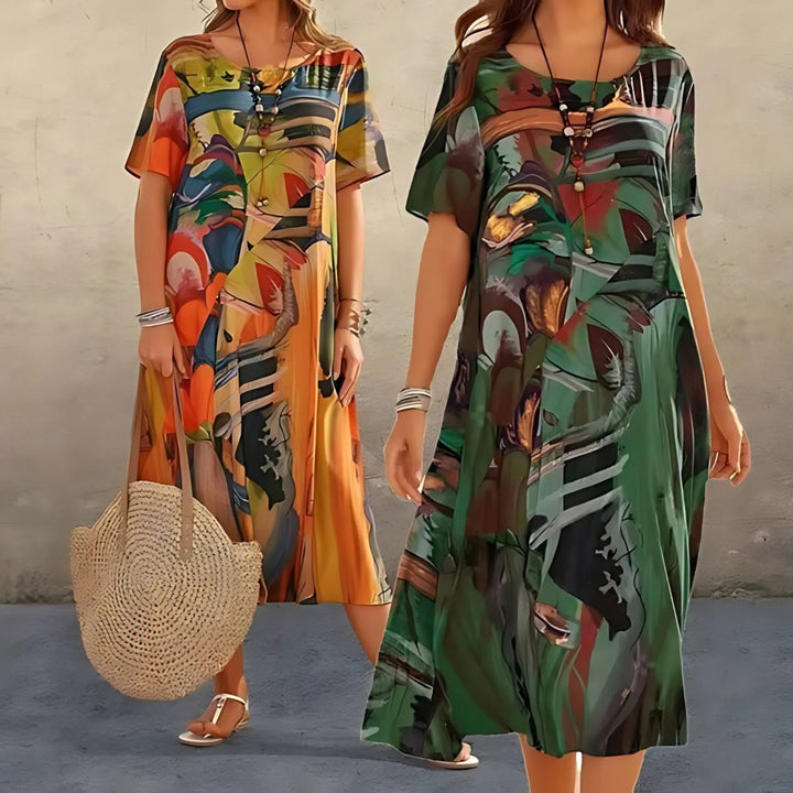 Versatile plus size abstract print midi dress. Women's relaxed fit, short sleeve design, perfect for everyday style.