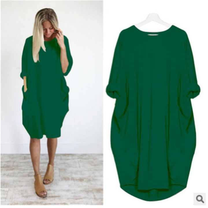 Flowy women's plus size batwing sleeve midi dress, a comfortable black design suitable for casual outings.