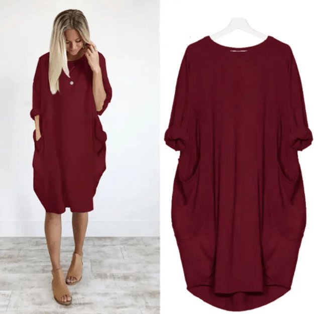Casual women's plus size pocket dress, featuring an oversized fit and elegant batwing sleeves.