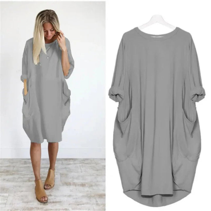 Fall fashion: Women's plus size midi dress with batwing sleeves, perfect for casual spring or fall style.