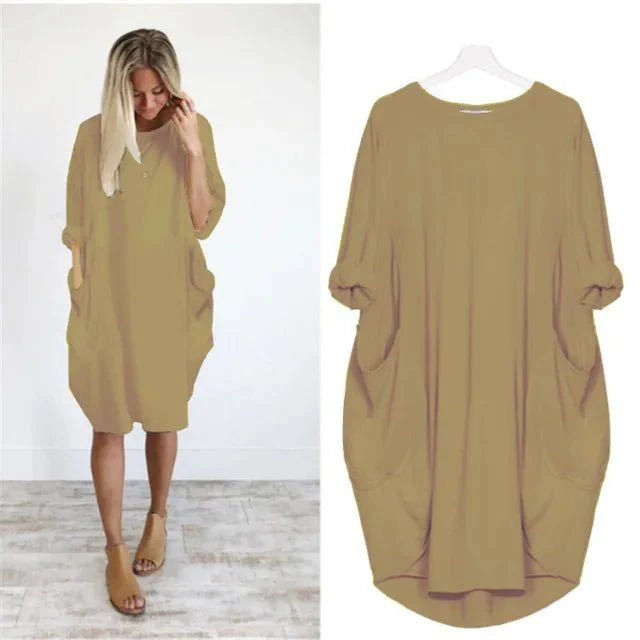 Stylish plus size black midi dress, designed with batwing sleeves and an oversized fit for ultimate comfort.