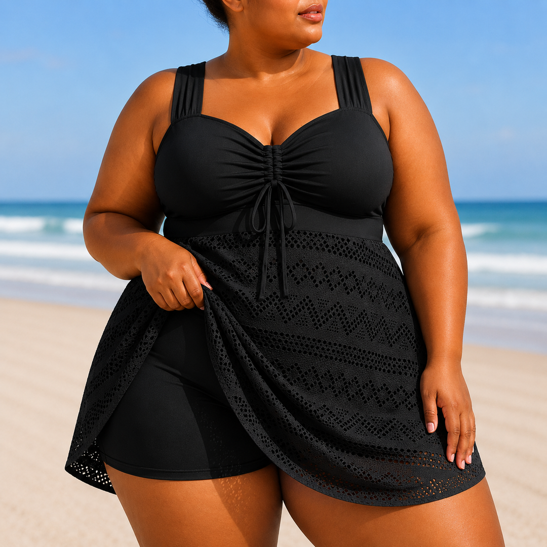 Women's plus size elegant black beach swim dress, modest swimwear perfect for resort wear or vacation.